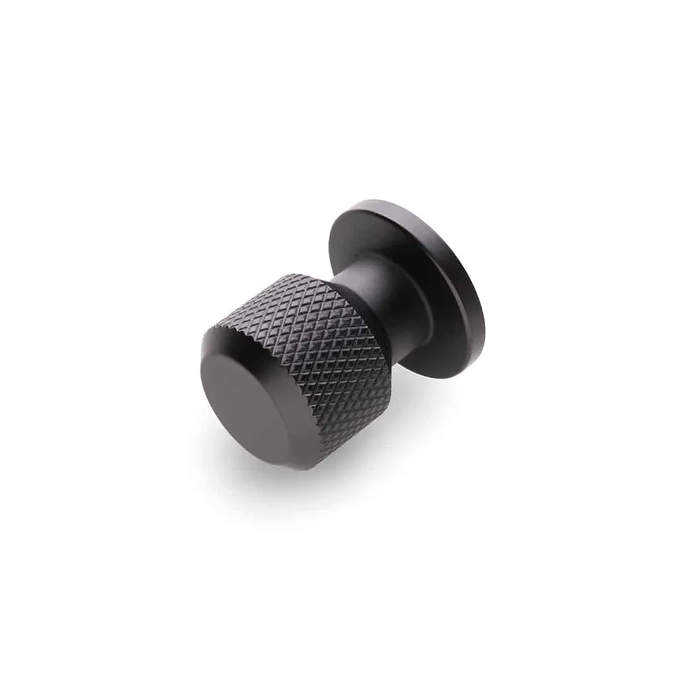 caple-m-belknopf-schwarz-r-ndeltiert image 1